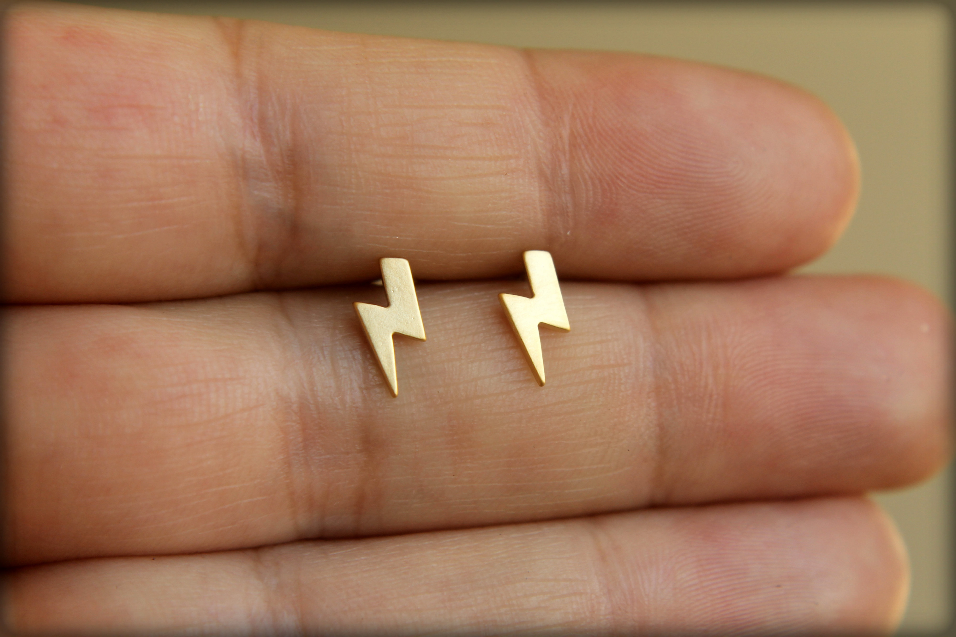 gold lightning bolt earring